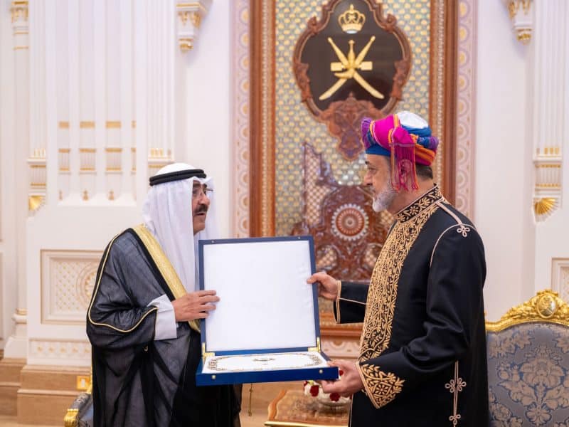 His Majesty the Sultan and His Highness the Emir of the State of Kuwait exchange medals and souvenirs