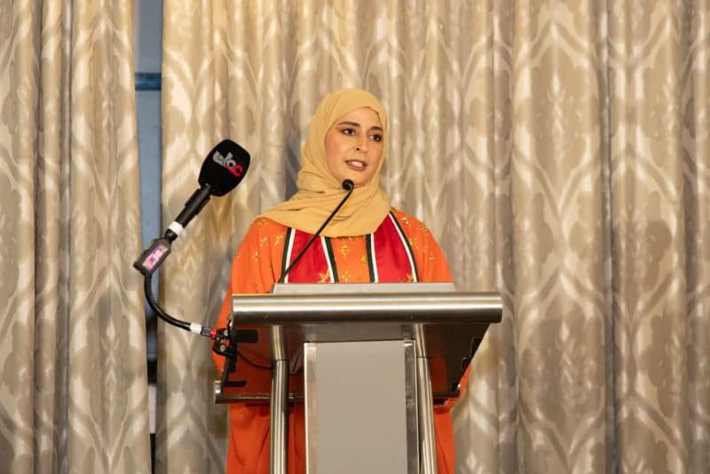 Sabra bint Ahmed Al Hothi, the Washington Embassy Counsellor, delivers a speech highlighting Oman's achievements