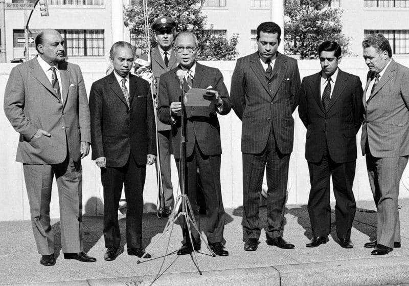 HH Tarik bin Taimur Al Said, Prime Minister of Oman (far left) at the flag raising ceremony